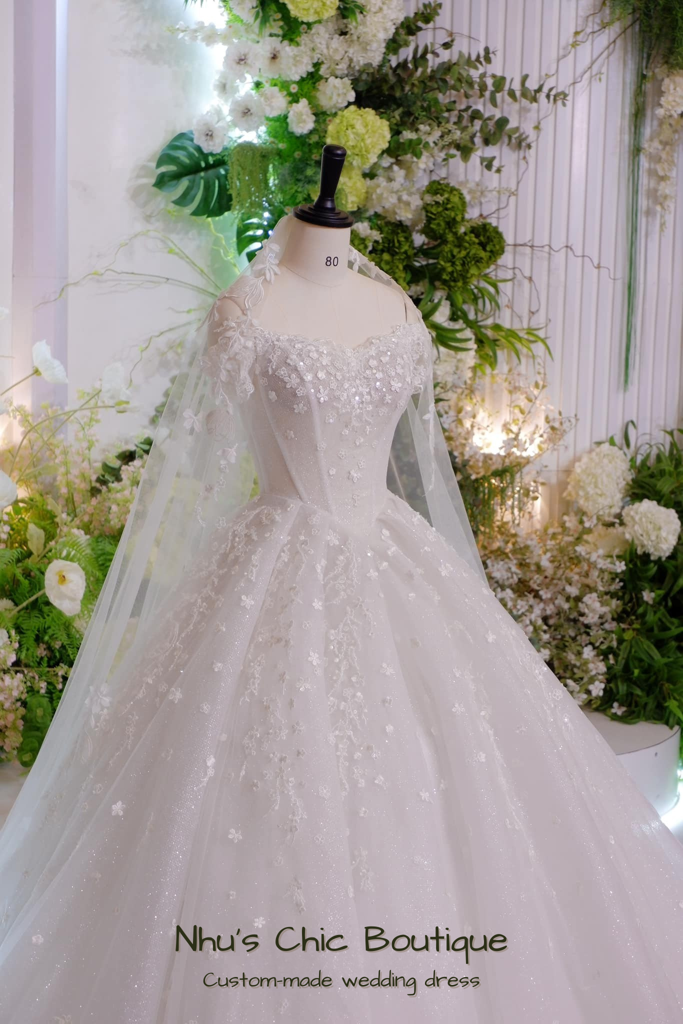 WD018 - Sparkling Off-Shoulder Ball Gown Wedding Dress with 3D Floral Appliqués