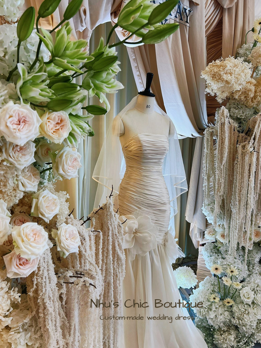 WD016-Blossom Draping Gown – Ruched Mermaid Wedding Dress with Floral Detail and Soft Tulle Train