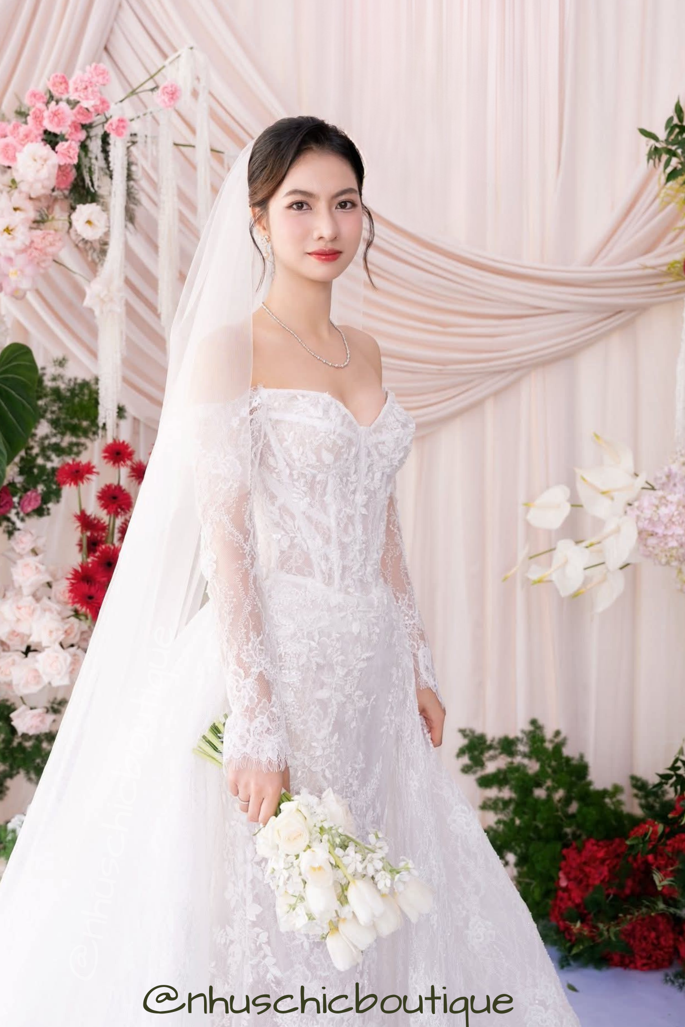 Close-up of the sheer corseted bodice and sweetheart neckline of a custom Japanese bridal gown.